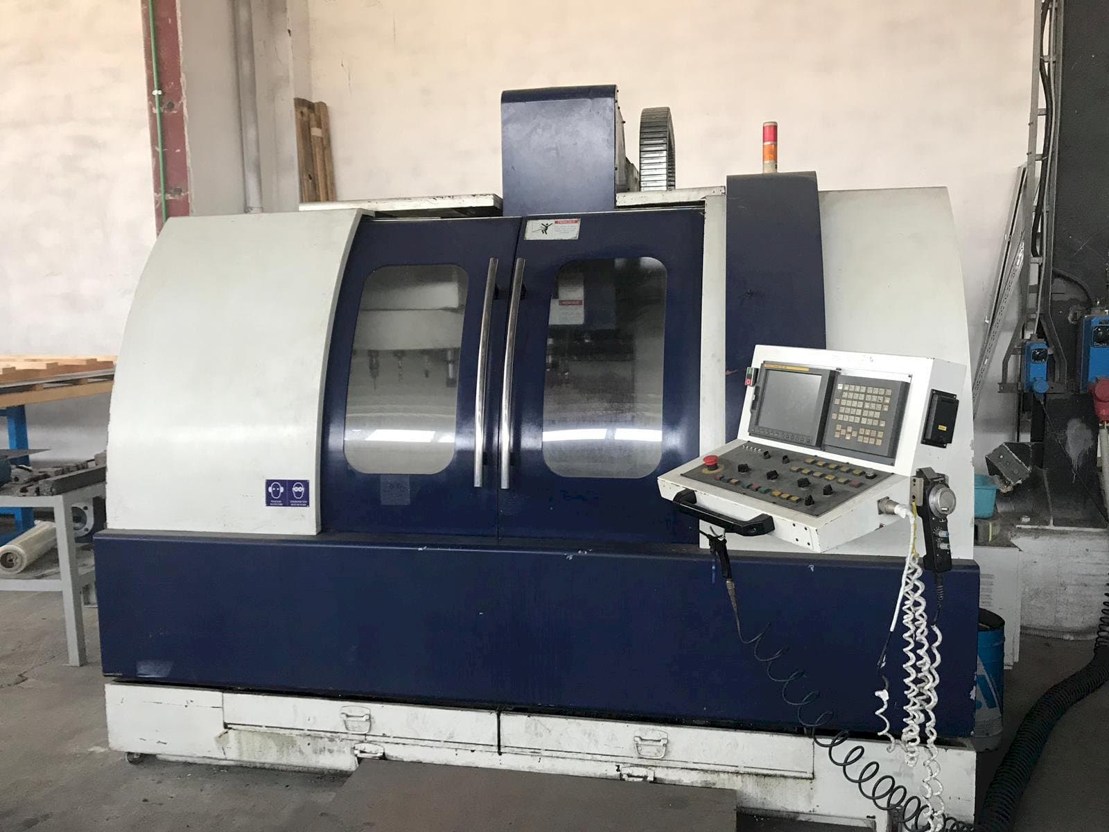 Vista frontal de la máquina Euma Spinner CAMS 200