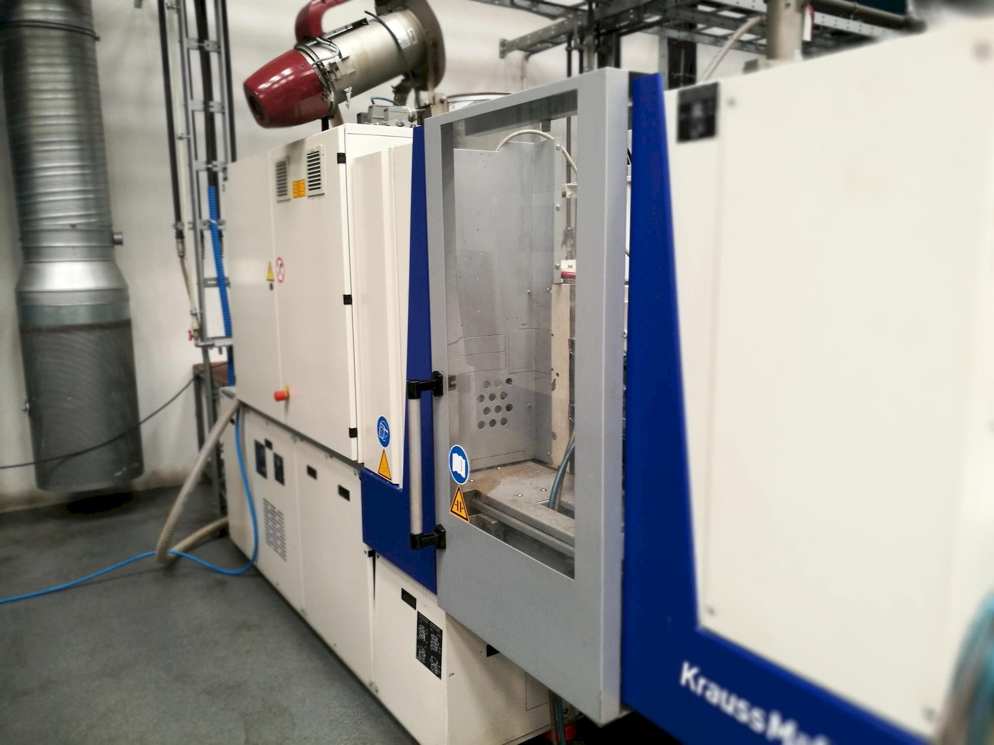 Vista frontal de la máquina Krauss Maffei KM 35-55 CX
