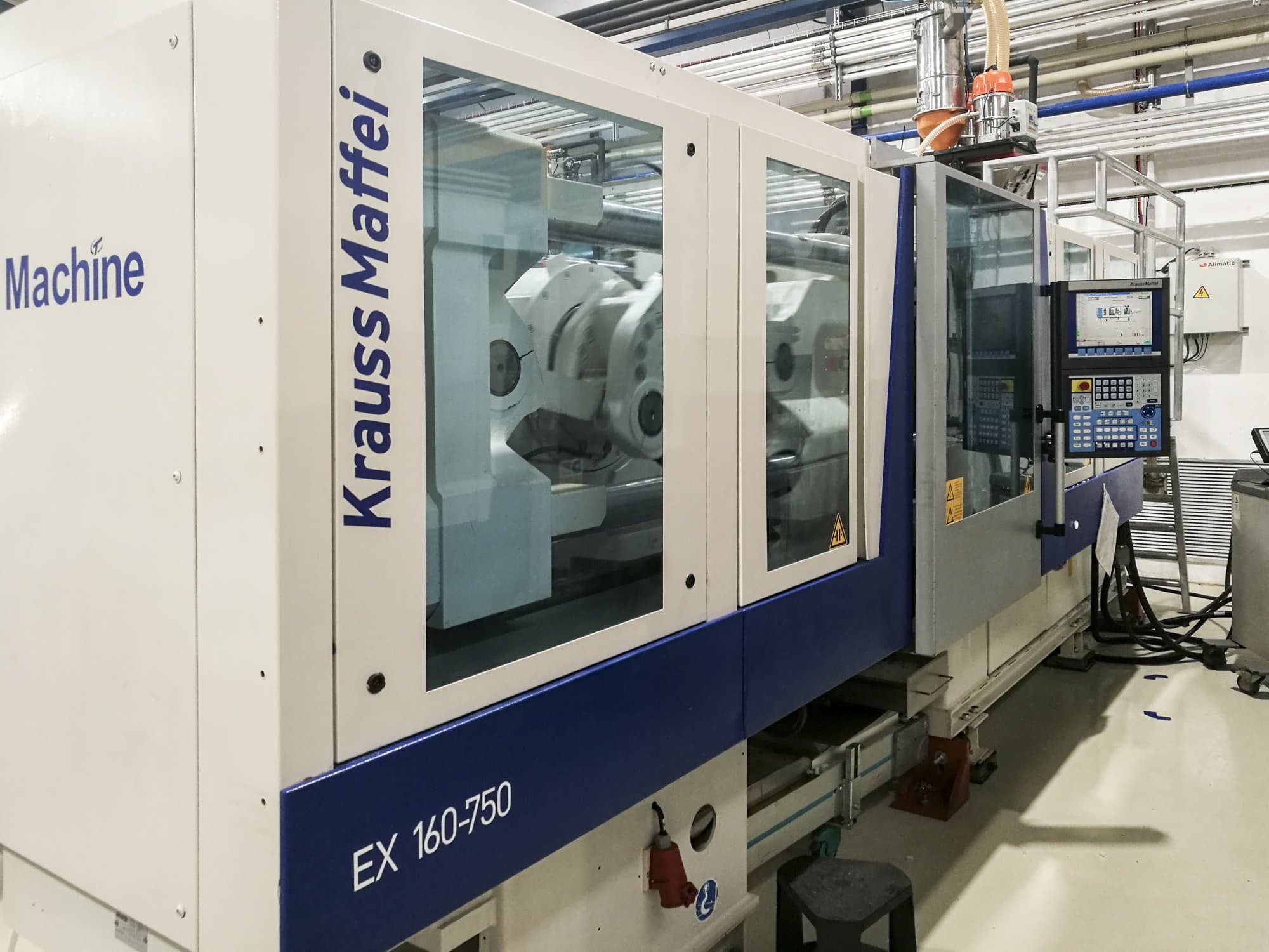 Vista izquierda de la máquina Krauss Maffei 160-750 EX