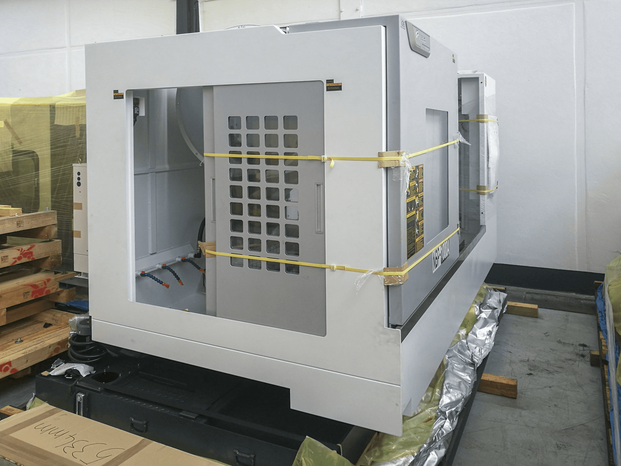 Vista izquierda 1 de la máquina Feeler NBP-1000A