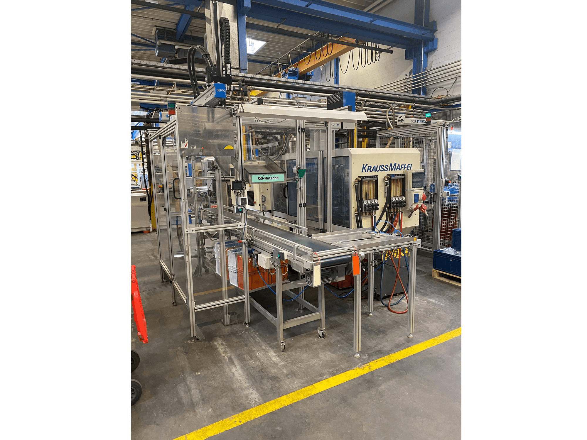 Vista frontal de la máquina Krauss Maffei 80-390 C2