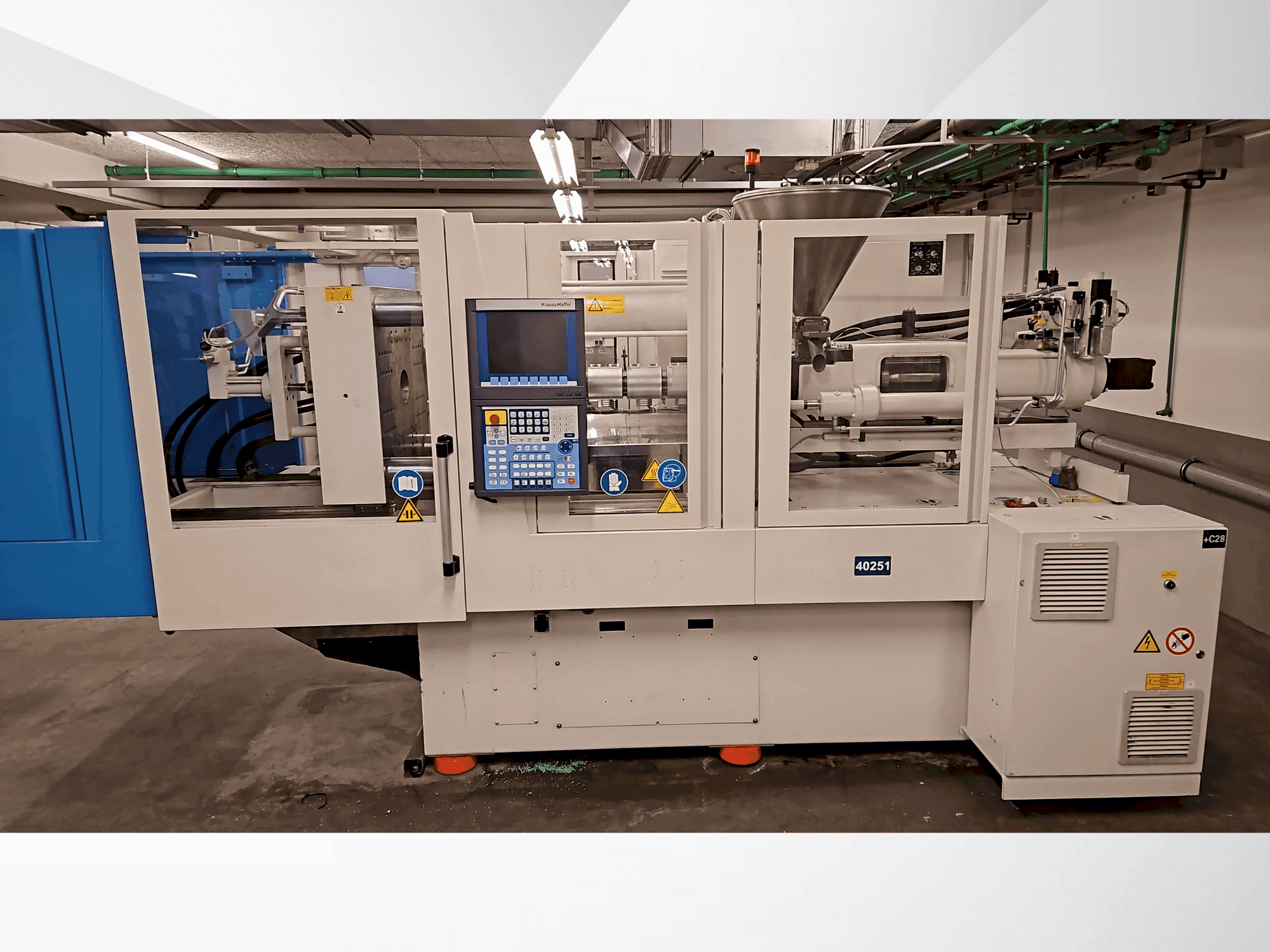 Vista frontal de la máquina Krauss Maffei 110-750 CX