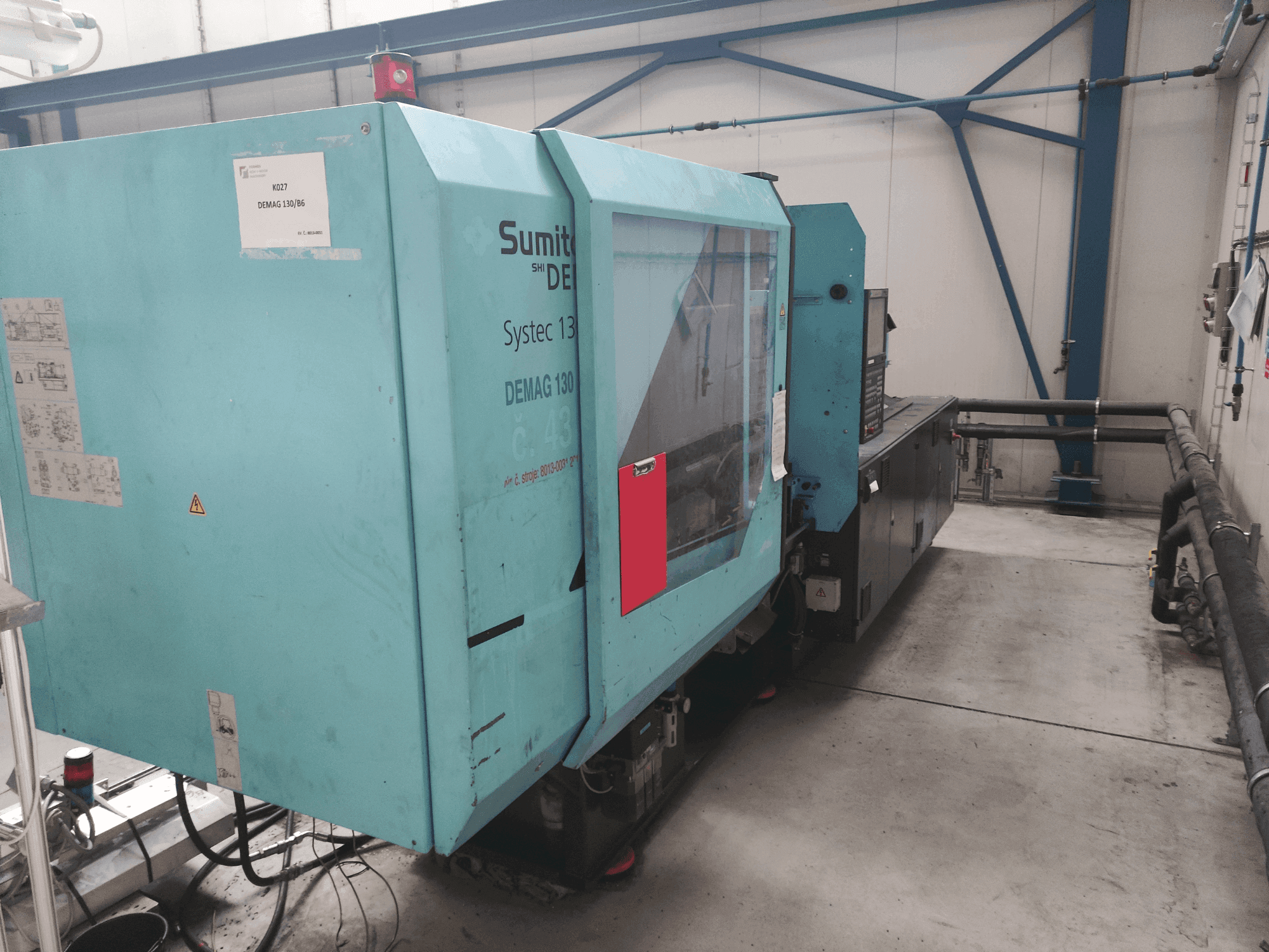 Vista frontal de la máquina DEMAG Systec 130/475-430